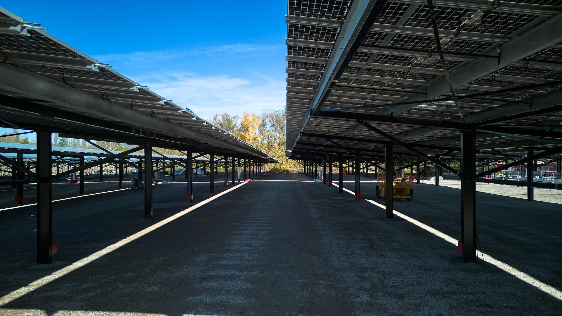 Photovoltaic shade structure providing solar energy generation and parking protection in Lyon