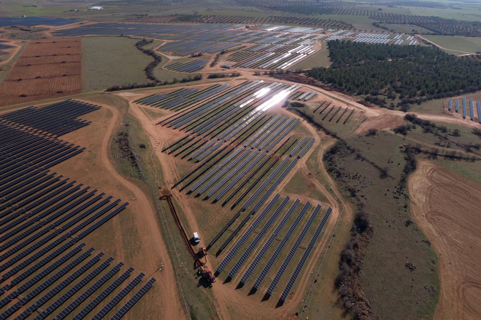 Utility-scale solar farm with ground-mounted photovoltaic panels in Ciudad Real, Spain