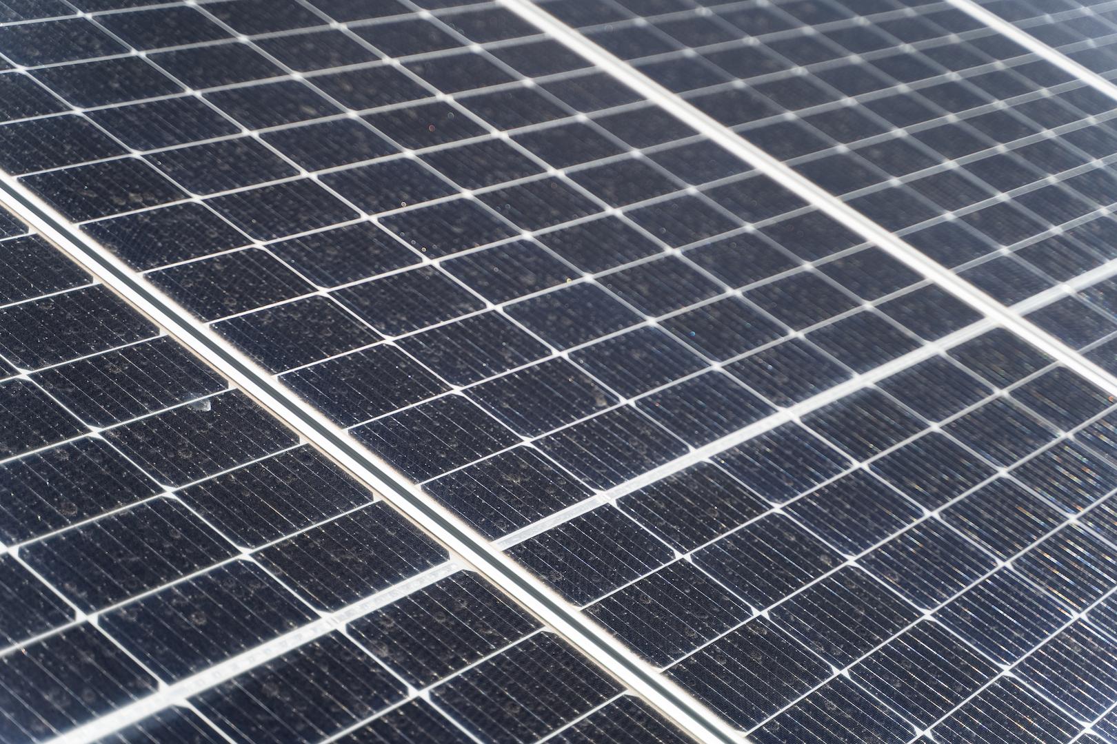 Solar panels installed on rehabilitated land demonstrating renewable energy and land restoration