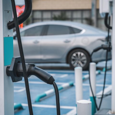 Public electric vehicle charging stations installed in a car park, showing accessible EV charging points for everyday mobility