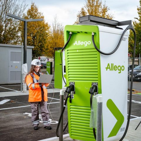 Allego high-power electric vehicle charging station with on-site operational monitoring, demonstrating fast-charging infrastructure management