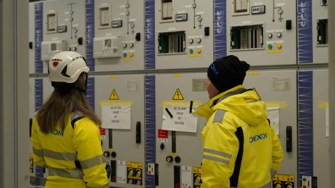 Omexom team gathered at a substations project site